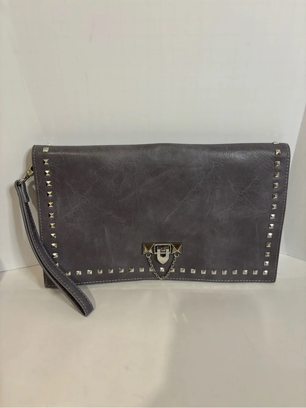 Stud-Trim Gray Wristlet Clutch